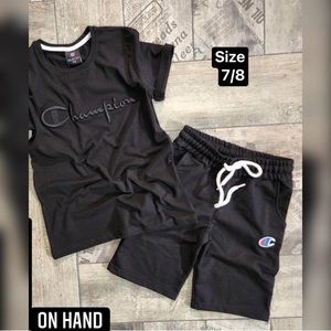 I’m selling boys clothes. This item is a black champion matching set. New
